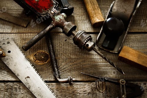 Preview: The Old Working Tool. Many Old Working Tools ( Drill, Mallet, Saw And Others) On A Wooden