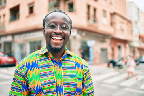 Preview: Young African American Man Smiling Happy Standing At Street Of City.