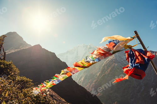 Preview: Buddhist Prayer Flags In Himalaya Mountains At Sunrise. View Of Thamserku Mount In Himalayas