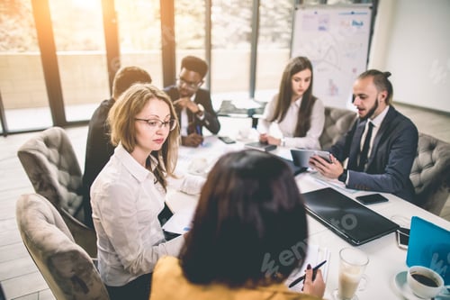 Preview: Successful Team Leader And Business Owner Leading Informal In-House Business Meeting. Businessman