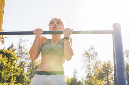 Preview: Fit Woman Doing Pull-Ups
