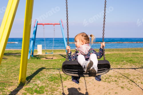 Preview: Happy Child Girl On Swing In Summer Day
