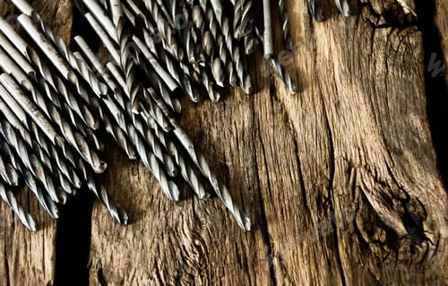 Preview: Working Tools. Drills On A Wooden Background.