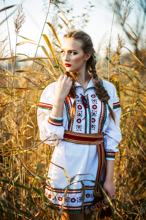Preview: Young Girl On The Summer Field In National Belarus Clothes, Fashion.Noisy Image. Grain Texture Is
