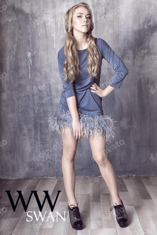 Preview: Young And Emotional Woman In Fashion Dress Over Glamour Background
