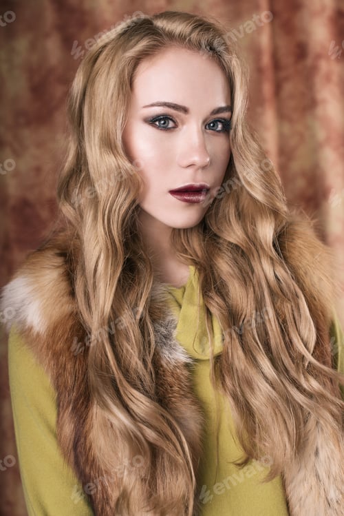 Preview: Glamorous Portrait Of A Beautiful Young Woman In A Fur Vest