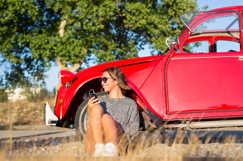 Preview: Young Woman Resting At Car Trip By The Countryside