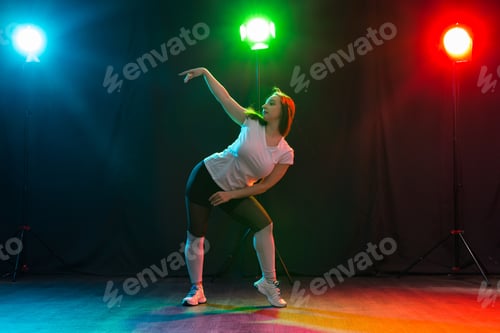 Preview: Hip-Hop, Jazz-Funk, Tecktonik, Waacking, Trance And Street Dances Concept - Young Woman Dancing