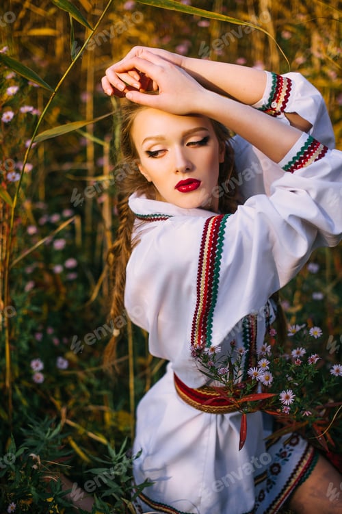 Preview: Young Girl On The Summer Field In National Belarus Clothes, Fashion.Noisy Image. Grain Texture Is