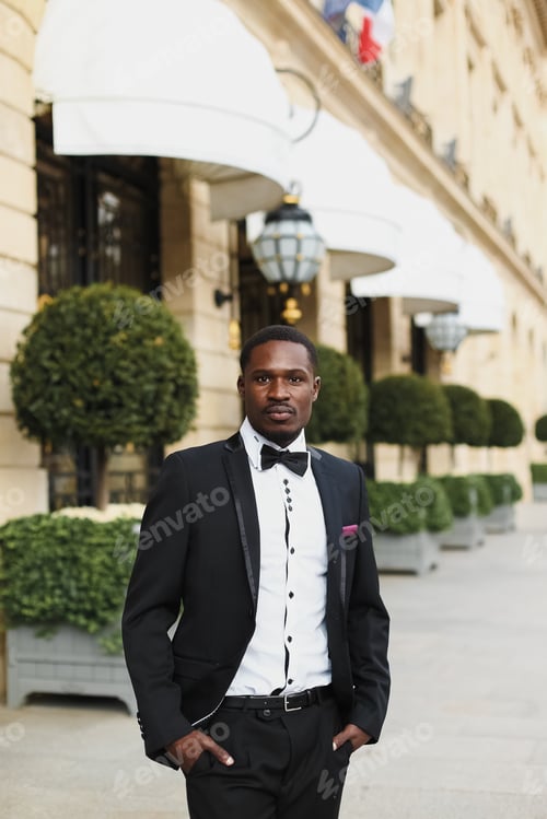 Preview: Afro American Man Wearing Suit And Standing Outside. Concept Of Black Businessman.
