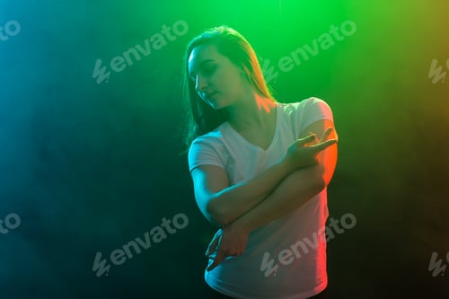 Preview: Modern Dance, Jazz Funk And People Concept - Close Up Portrait Of Dancer Woman With Hands On Waist