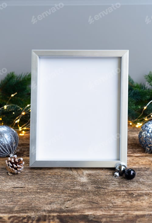 Preview: Elegant Gray Christmas Scene On Natural Wood Background With Empty Frame