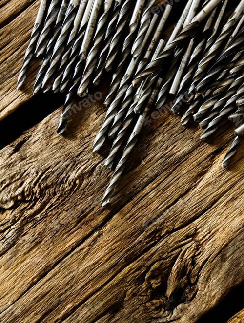 Preview: Working Tools. Drills On A Wooden Background.