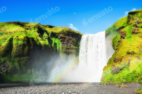 Preview: Skogafoss Waterfall In Southern Iceland. Summer Landscape. Famous Travel Destination