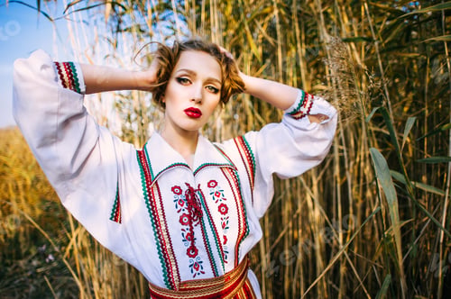 Preview: Young Girl On The Summer Field In National Belarus Clothes, Fashion.Noisy Image. Grain Texture Is