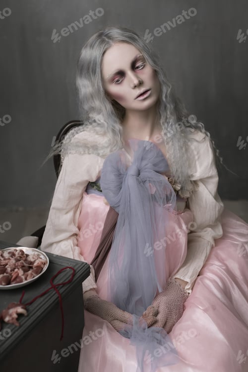 Preview: Dark Halloween Portrait Of Scary Bad Zombie Girl Sitting In A Chair And Collecting Hearts