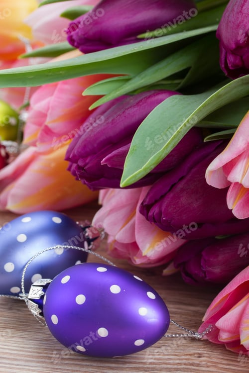 Preview: Easter Eggs With Bouquet Of Tulips On Wooden Table Cloe Up