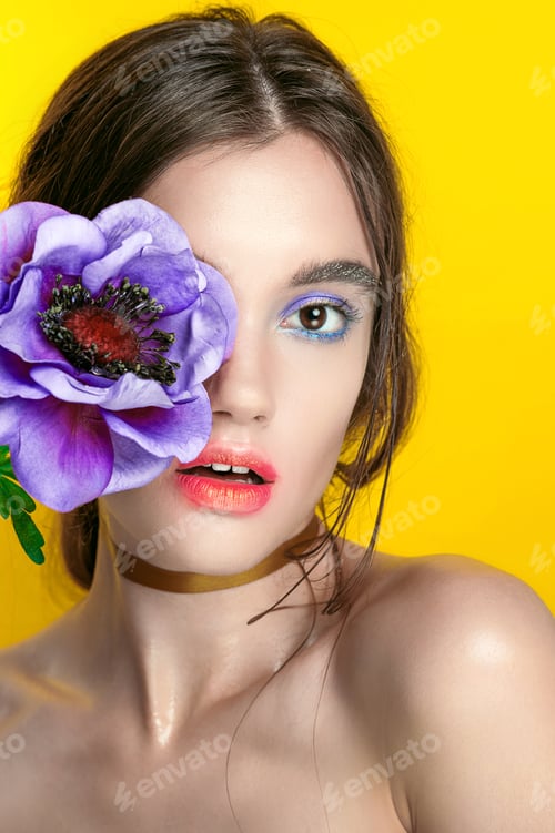 Preview: Beauty Girl Portrait With Vivid Makeup. Fashion Woman Portrait Close Up On Yellow Background