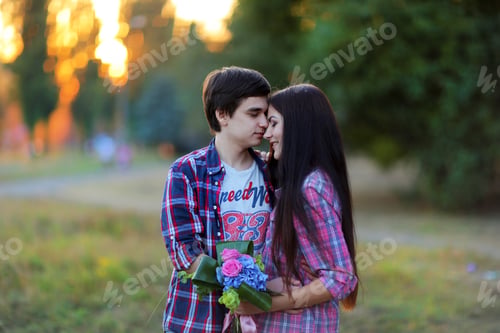 Preview: Guy And Girl Show Love And Pure Feelings For Each Other. Woman Smiling And Hugging Man Holding