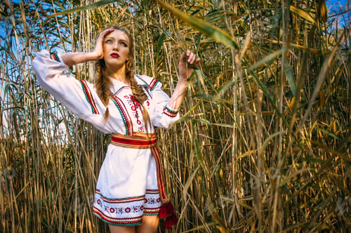 Preview: Young Girl On The Summer Field In National Belarus Clothes, Fashion.Noisy Image. Grain Texture Is