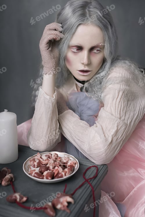 Preview: Dark Halloween Portrait Of Scary Bad Zombie Girl Sitting In A Chair And Collecting Hearts