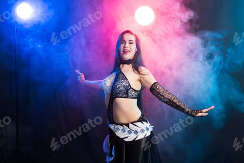 Preview: Girl Dancing Belly Dance, Fusion Or Tribal. A Woman In A Beautiful Costume Demonstrates Charming