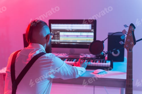 Preview: Professional Musician Recording Synthesizer In Digital Studio At Home, Music Production Technology