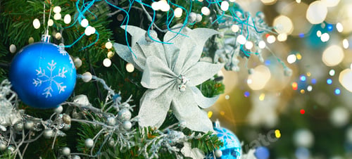 Preview: Christmas Tree With Holiday Blue And White Decorations And Lights Close Up
