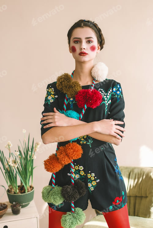 Preview: Fashionable Beautiful Brunette Happy Girl In A Jumpsuit With Floral Embroidery With Color Makeup