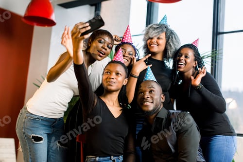 Preview: Young Beautiful African American Girls Celebrate Birthday And Make A Selfii On Their Smartphone.