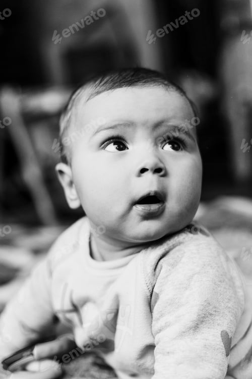 Preview: Baby Boy At Home. Close Up Portrait .Black And White