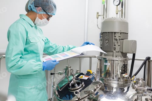 Preview: Factory Worker In Blue Suit Is Checking Readings Of Compressor