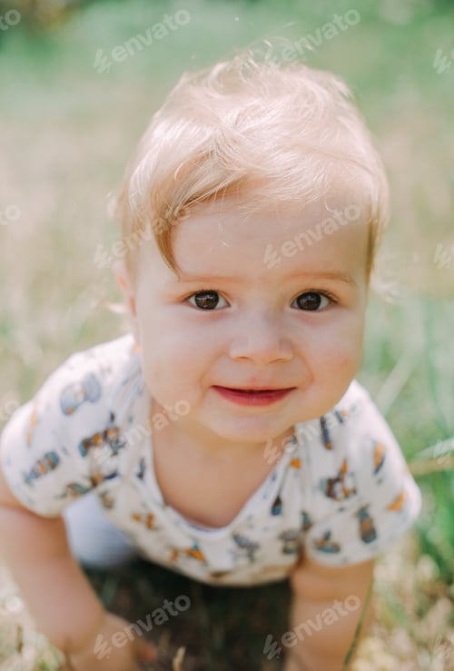 Preview: Serious 1-Year Infant Boy During His First Haircutting