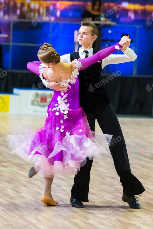 Preview: Riga, Latvia-December 15, 2019: Dance Couple Performs Juvenile European Standard Program On The