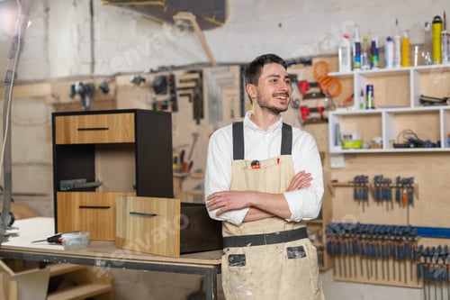 Preview: Furniture Factory, Small-Sized Companies And People Concept - Portrait Of A Smiling Male Worker At