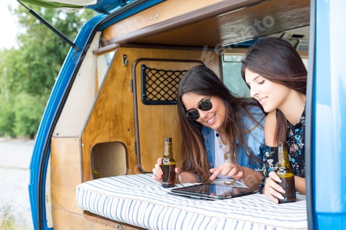 Preview: Summer Holidays, Road Trip, Vacation, Travel And People Concept - Smiling Young Hippie Women In Car