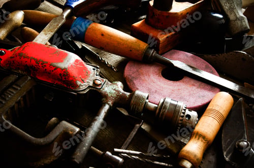 Preview: The Old Working Tool. Many Old Working Tools ( Ruler, Drill, Chisel And Others) On A Wooden