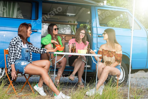 Preview: Summer Holidays, Road Trip, Vacation, Travel And People Concept - Smiling Young Hippie Women In Car