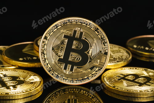 Preview: Golden coins with bitcoin symbol on black blackground