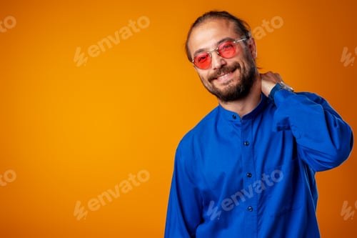 Preview: Cool long haired joyful man wearing glasses