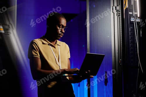 Preview: Server Technician using Laptop