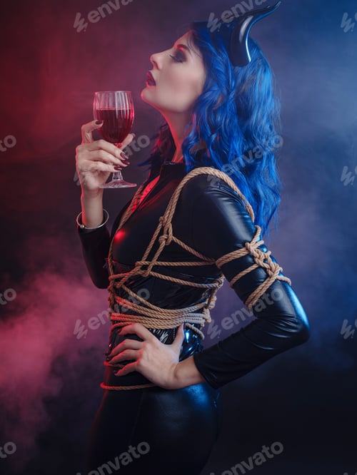 Preview: happy halloween, woman in devil costume