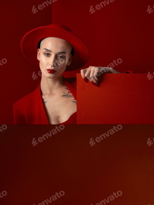 Preview: Portrait, red fashion and mockup with a woman on a studio background for marketing, advertising or