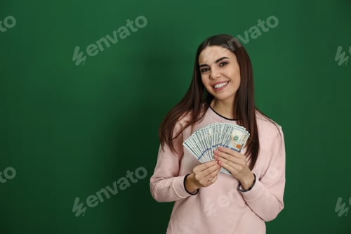 Preview: Young woman with money on color background