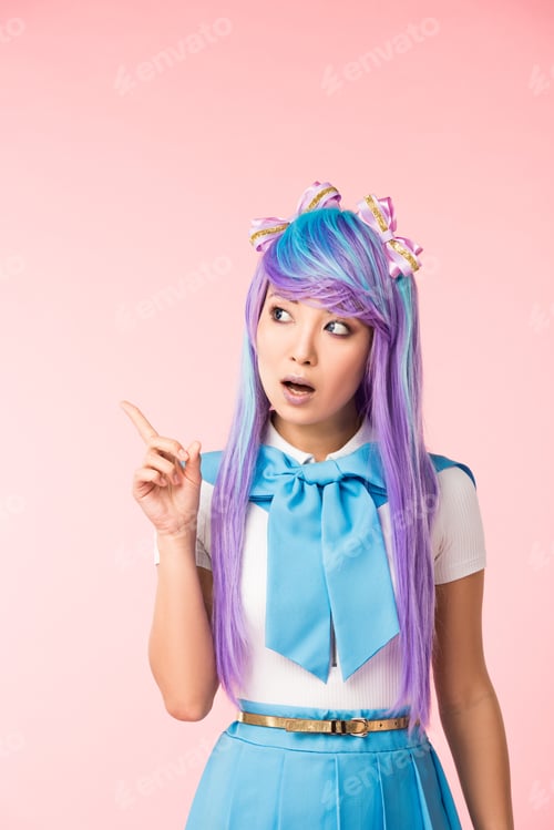 Preview: Pensive asian anime girl in wig showing idea sign on pink