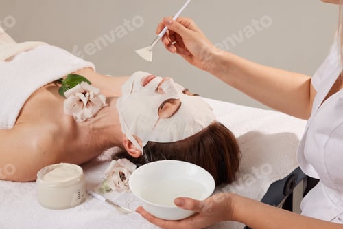 Preview: Woman Relaxing with a Sheet Mask Facial
