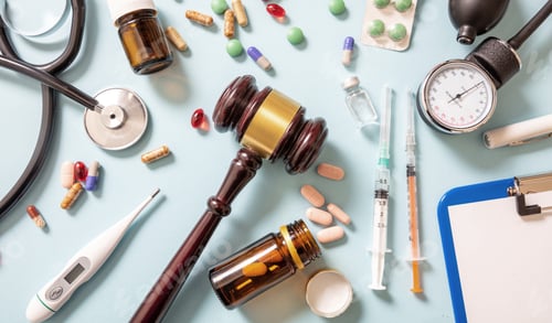 Preview: Health and Law flat lay. Judge gavel, medical stethoscope and medicine