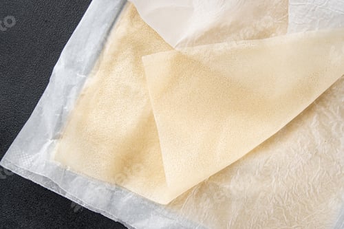 Preview: brik dough thin sheet raw packaging dough phyllo fresh delicious gourmet food background
