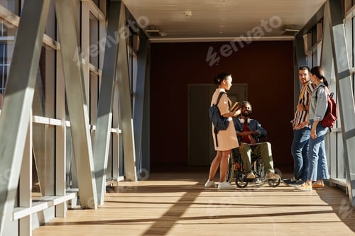 Preview: Group of students meeting in college building