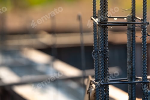 Preview: Concrete footings and reinforcing steel rods at a construction site. Groundwork for new building
